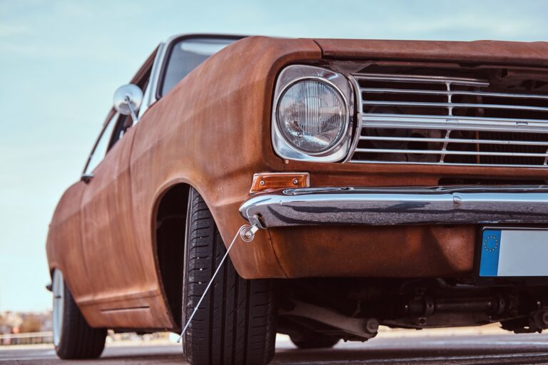 Cropped front view of a restored retro car. iconic muscle cars